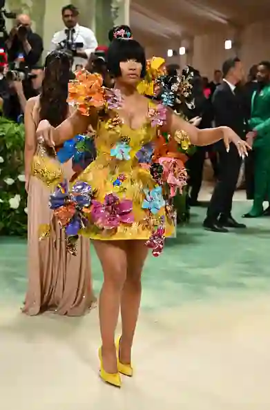 Nicki Minaj wows colorful dress decked out with 3D flowers at 2024 Met ...