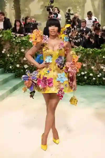 Nicki Minaj at Met gala in yellow coloured floral dress