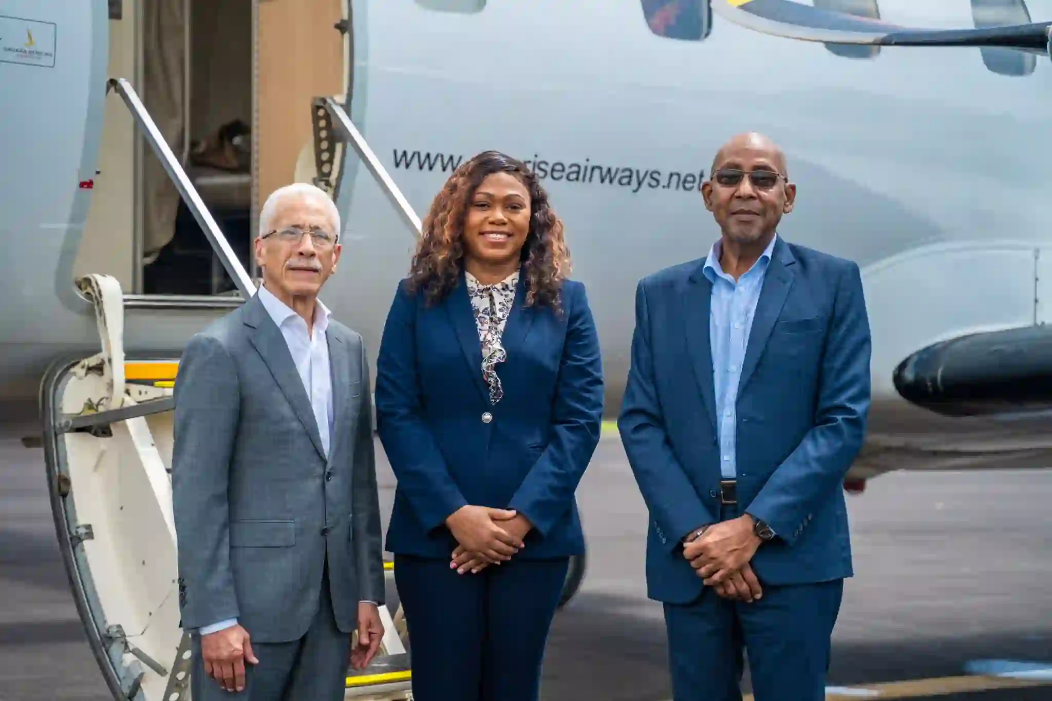 Sunrise Airways officials welcomed by Dr McIntyre