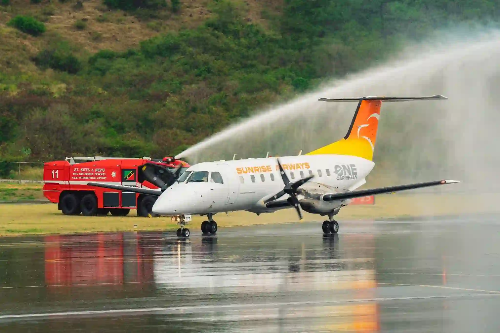 Sunrise Airways at St Kitts with water salute