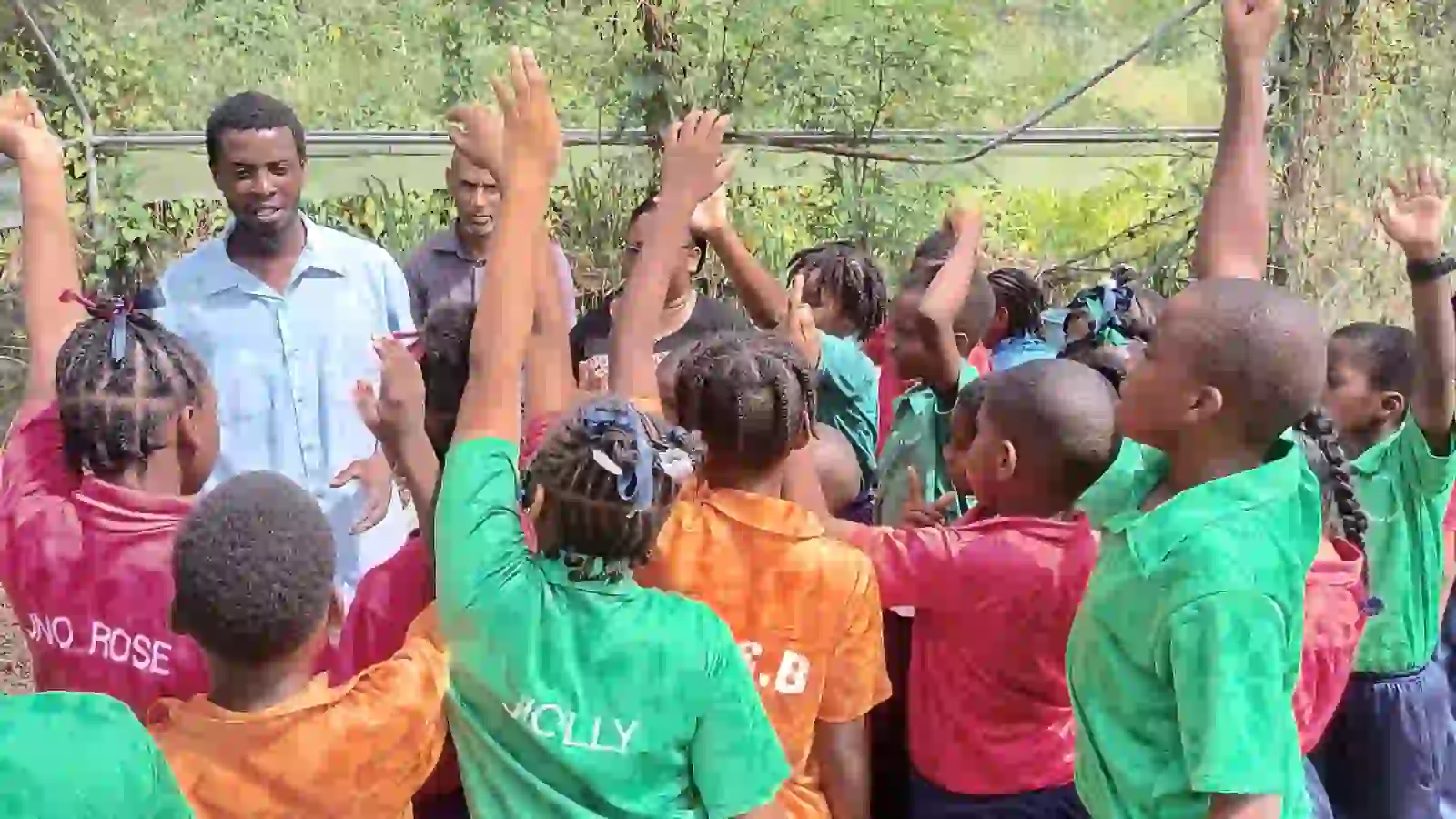 Students growing crop in Dominica