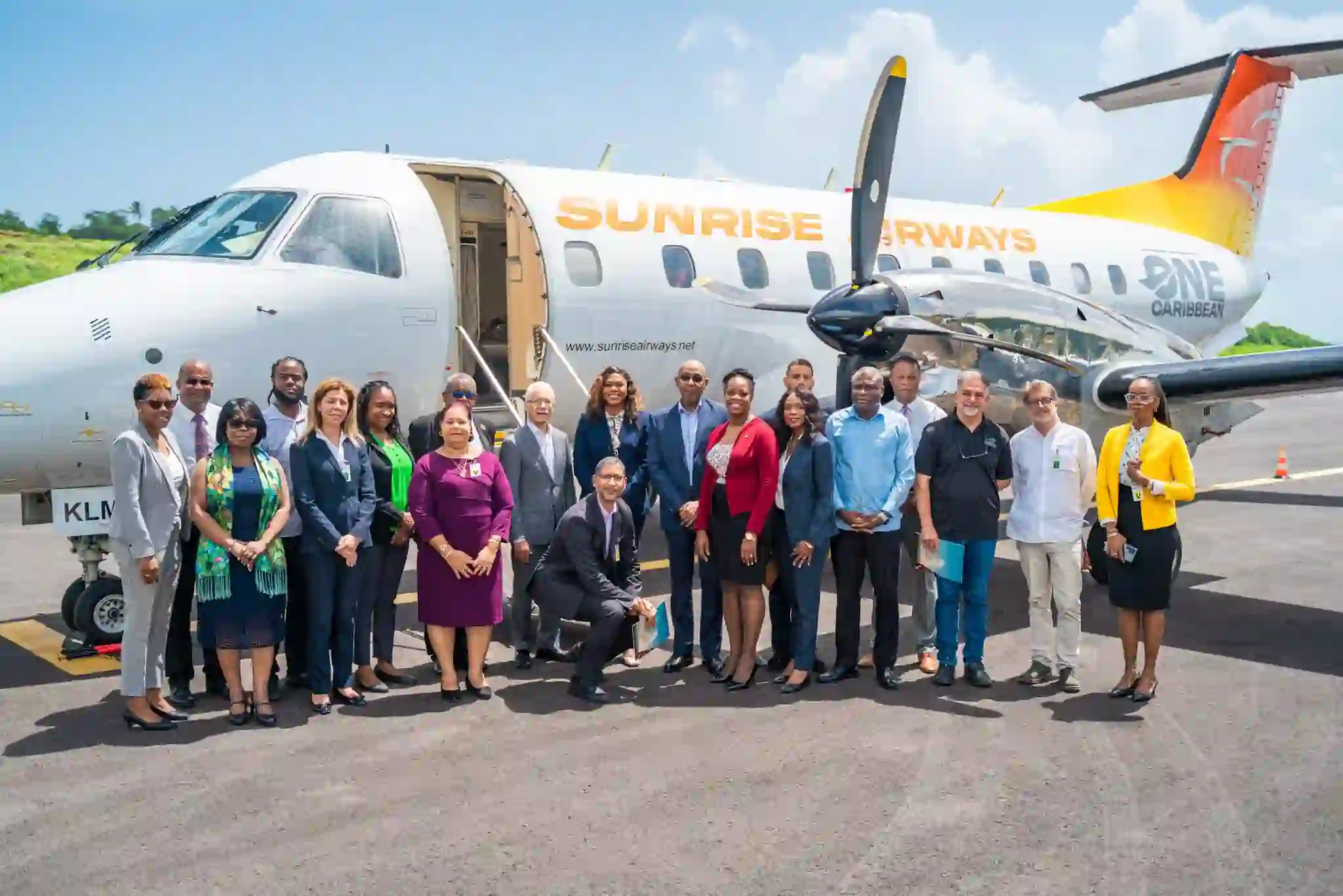 Sunrise Airways officials welcomed by Dr McIntyre