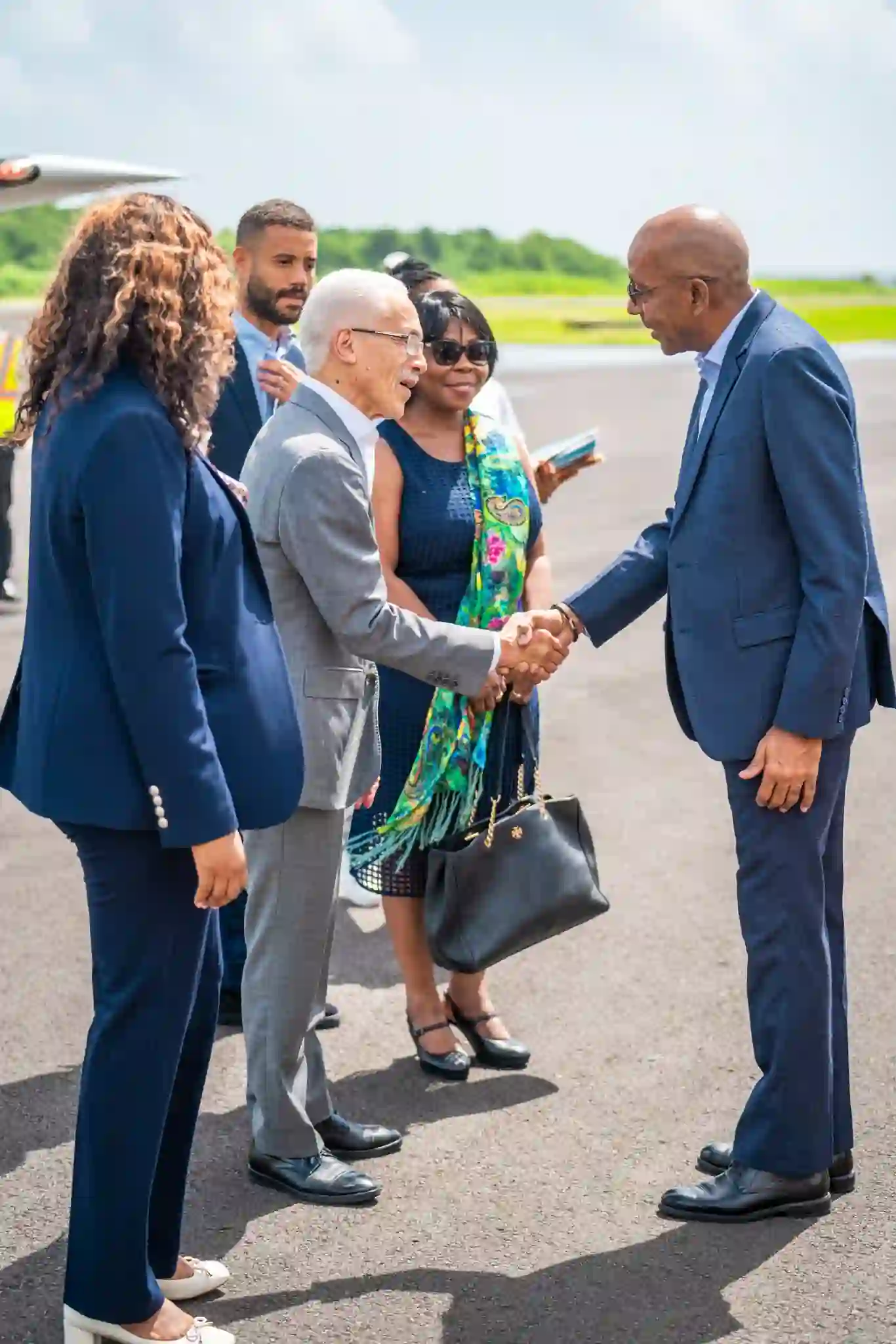 Sunrise Airways officials welcomed by Dr McIntyre